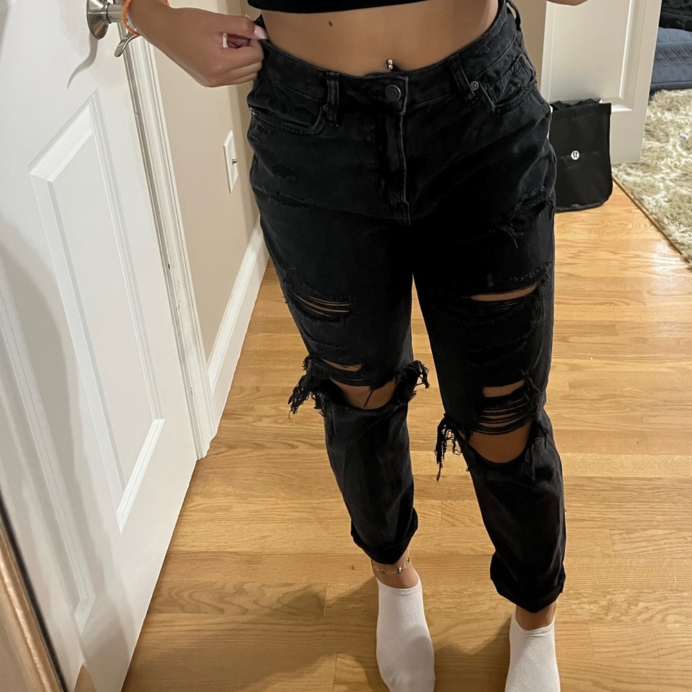 black ripped jeans